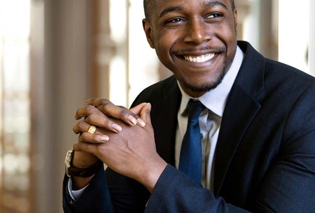 Handsome African American man smiling confidently