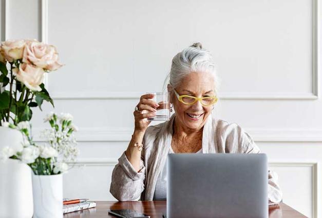 Senior woman working on a laptop