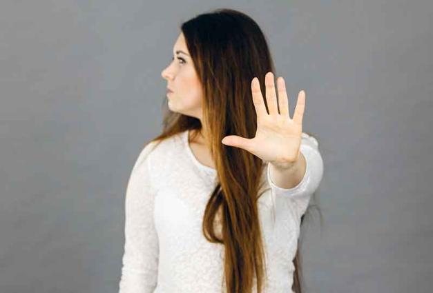 Woman saying no with hand