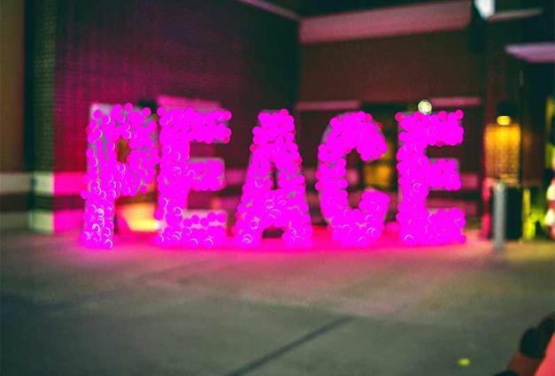 The word peace illuminated