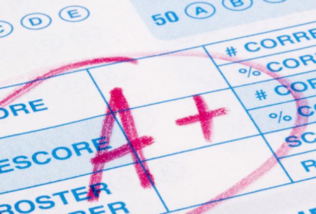 Image of test scantron sheet filled out and marked up with red text "A+" on it