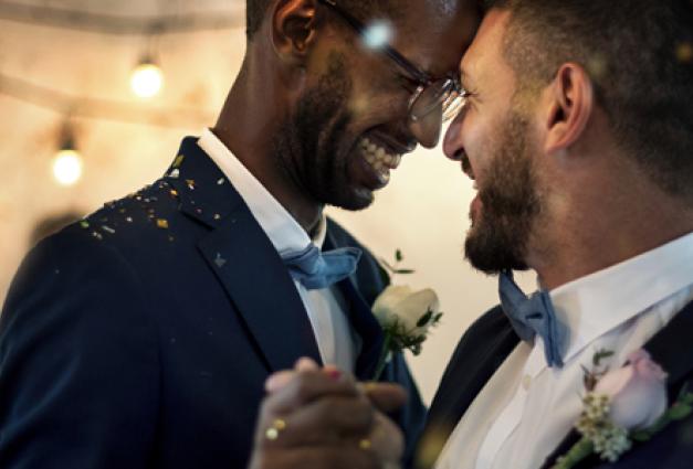 Image of two gay men dancing together