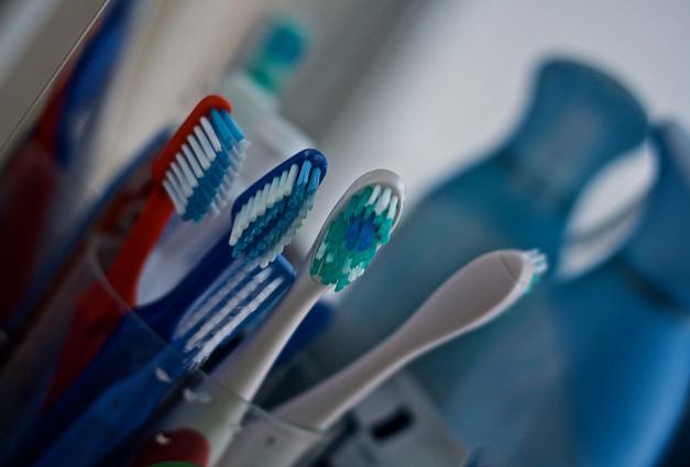 An image of a group of toothbrushes