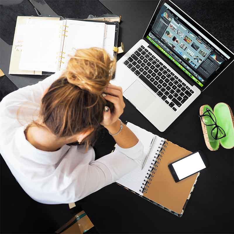 Stressed student with laptop