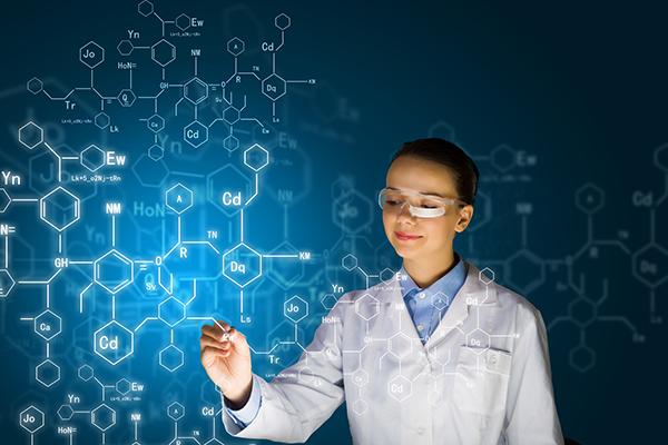Image of young woman scientist drawing chemical diagram